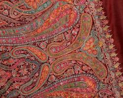 Pashmina shawl made from fine Changthangi goat wool, featuring delicate traditional Sozni and Aari embroidery, showcasing authentic Kashmiri craftsmanship.